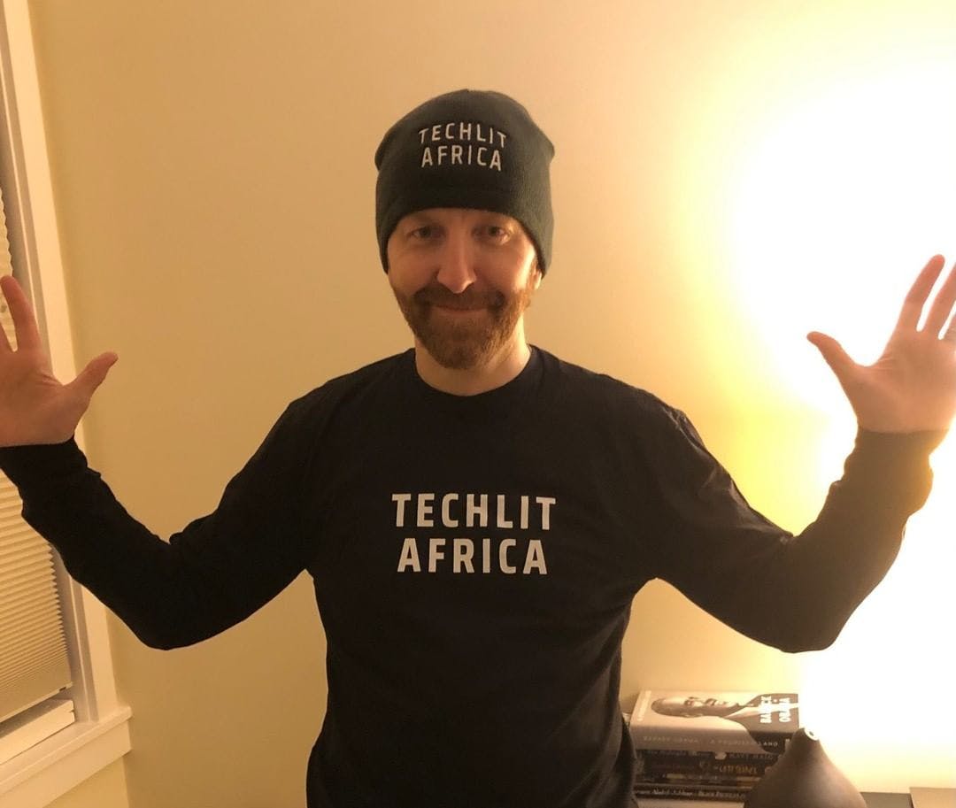 A TechLit supporter wearing TechLit apparel