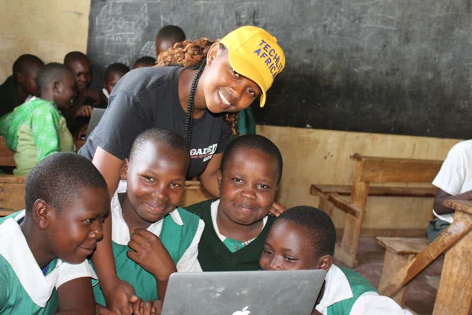Irene Pepit helping students with their used macbook pro