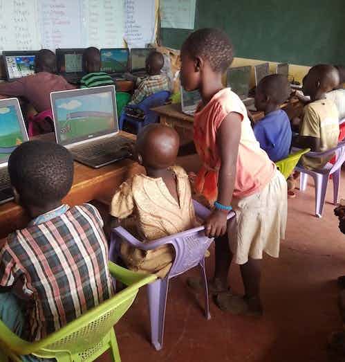 Students learning on refurbished laptops (effectively diverting e-waste)