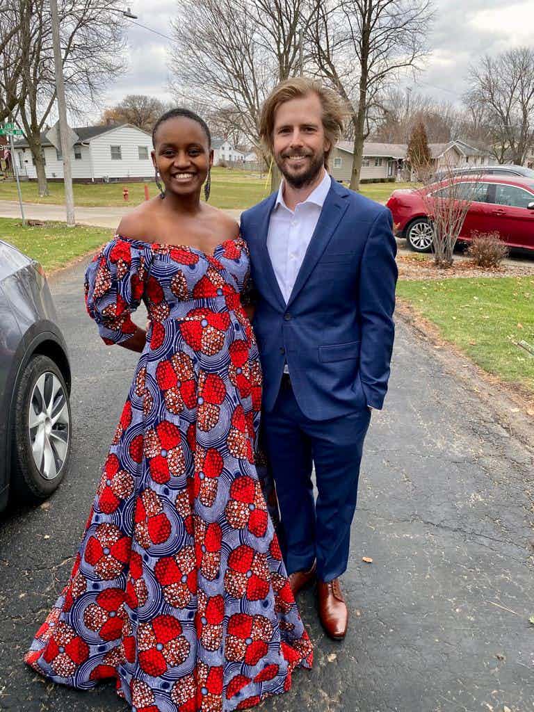 Nelly Cheboi and Tyler Cinnamon by the driveway dressed up