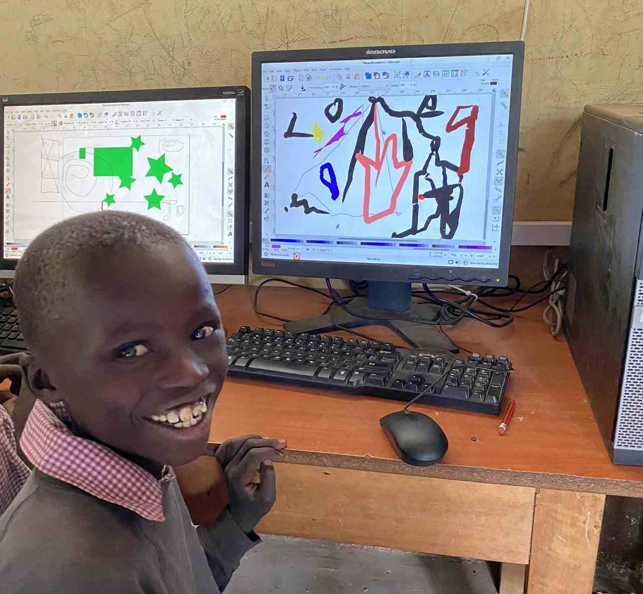Student at Barina showing his abstract art on inkscape