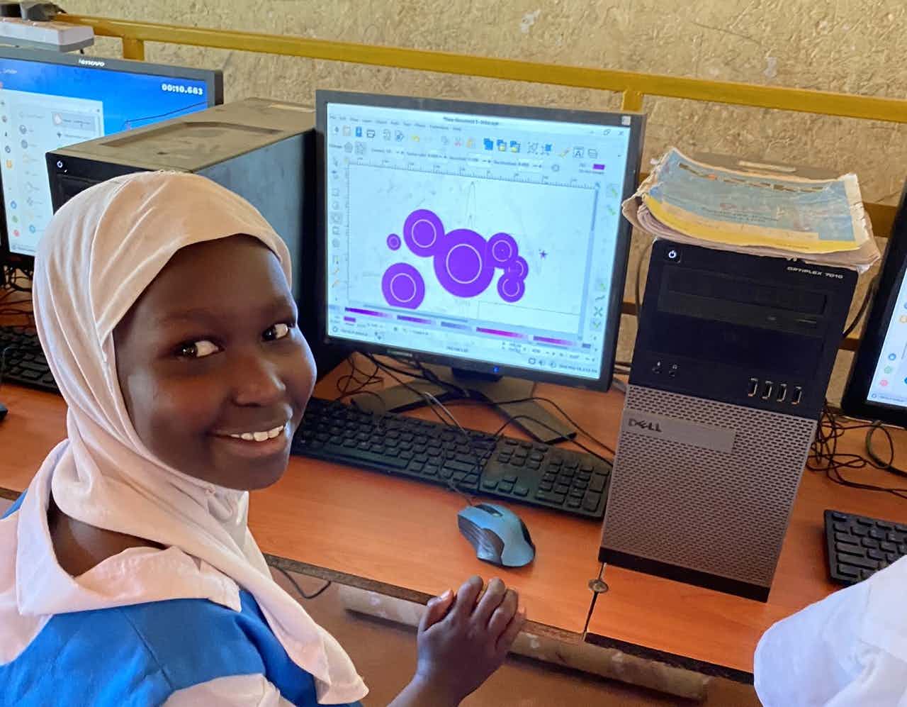 Student at Mogotio primary using spirals on Inkscape